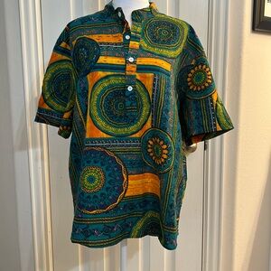 Men’s tribal shirt. Size 3X but it’s more like an XL-2X.